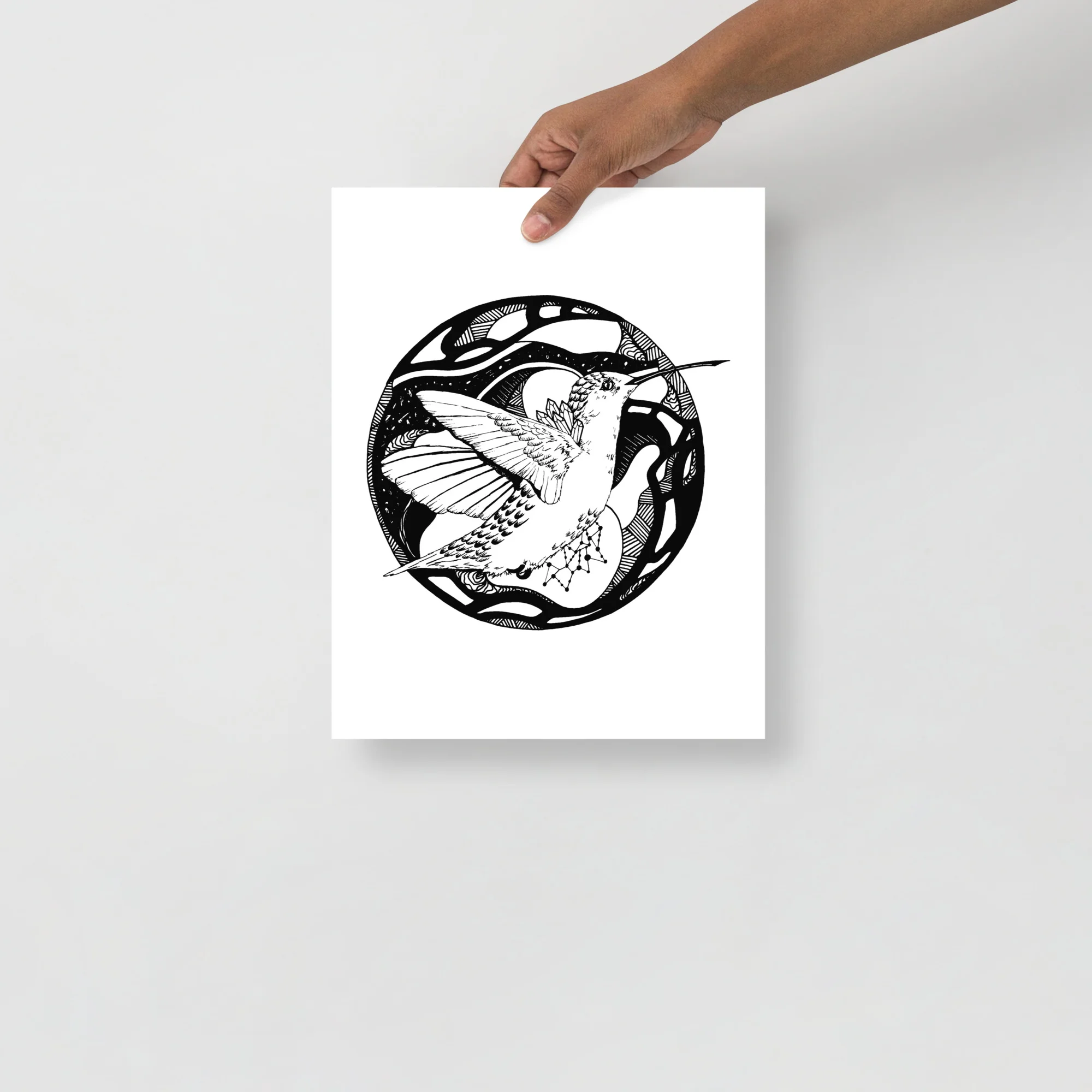 Black and white hummingbird wall art print featuring a detailed hummingbird illustration within a decorative circular frame.