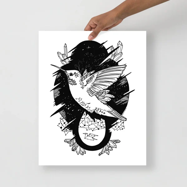 Black and white hummingbird wall art with intricate line drawing featuring wings spread and celestial elements