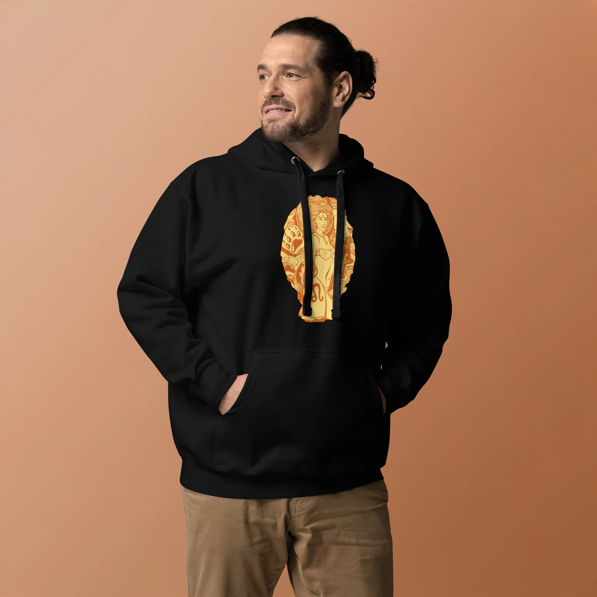 Man wearing black leo hoodie with golden zodiac artwork on chest, featuring a relaxed front pose