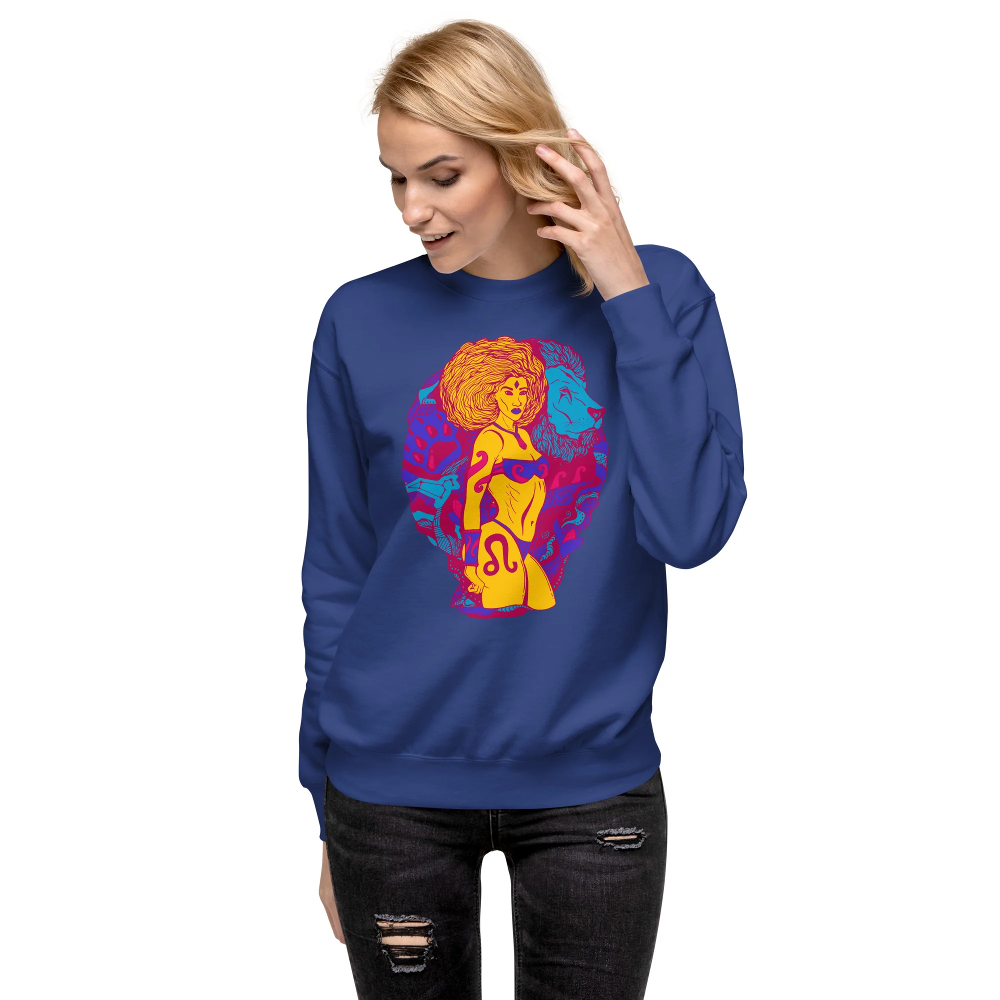Woman wearing navy leo sweatshirt with vibrant yellow and colorful zodiac design featuring fierce warrior artwork
