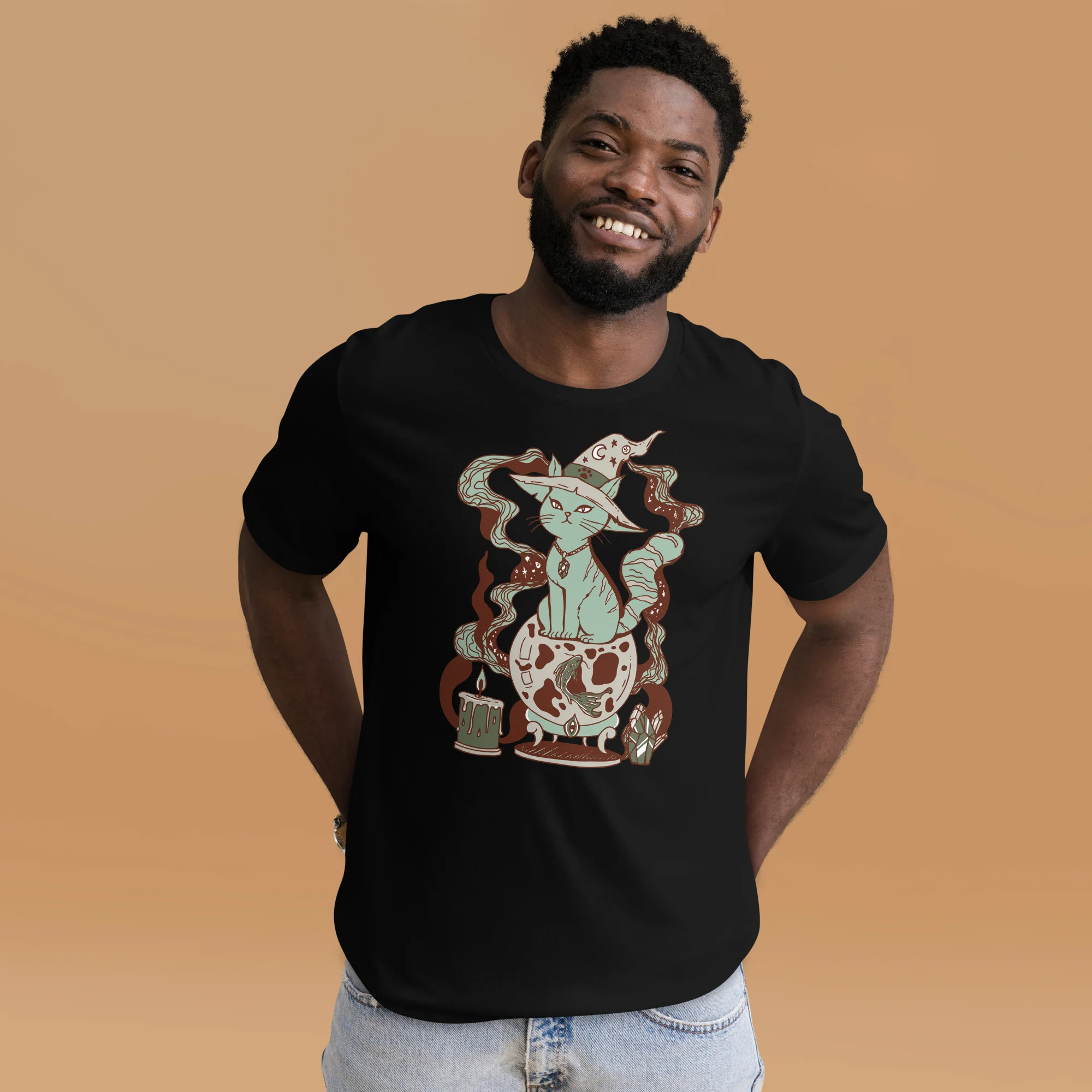 Man wearing black magical cat t-shirt with sage green fortune cat design and mystical artwork