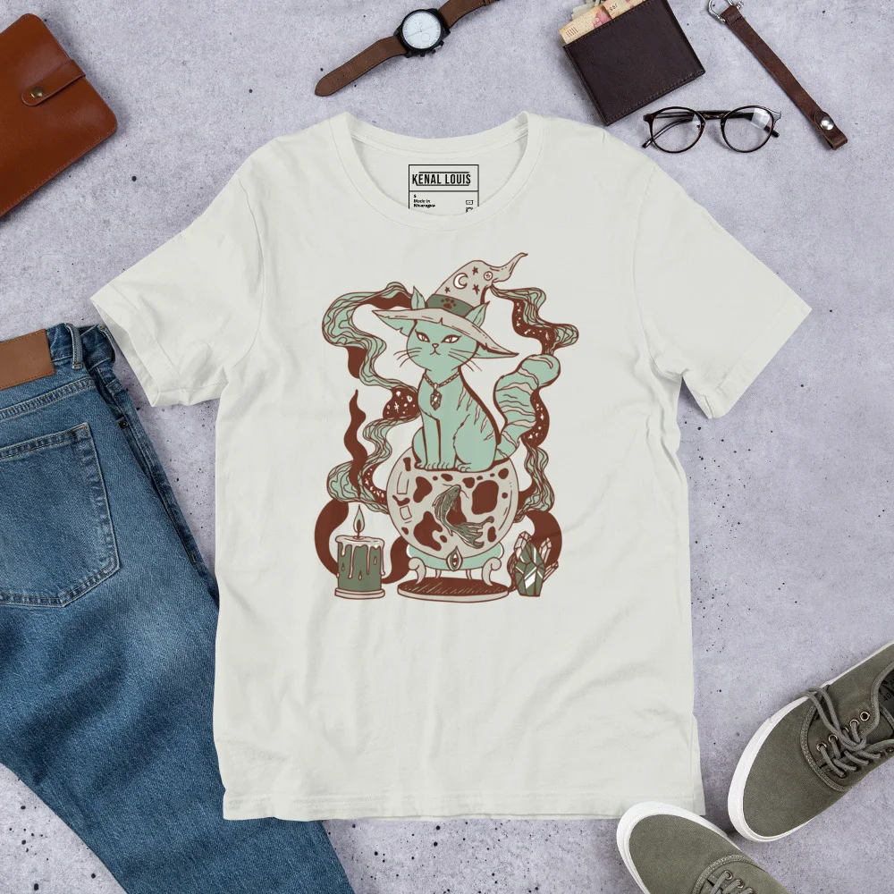 Cream magical cat t-shirt featuring sage green and brown fortune cat artwork with mystical design elements
