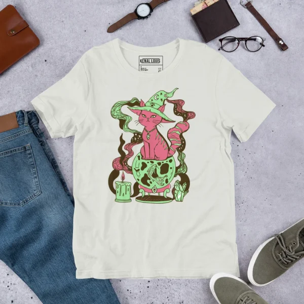 Soft cream magical cat t-shirt featuring pink fortune cat with green snakes and mystical elements