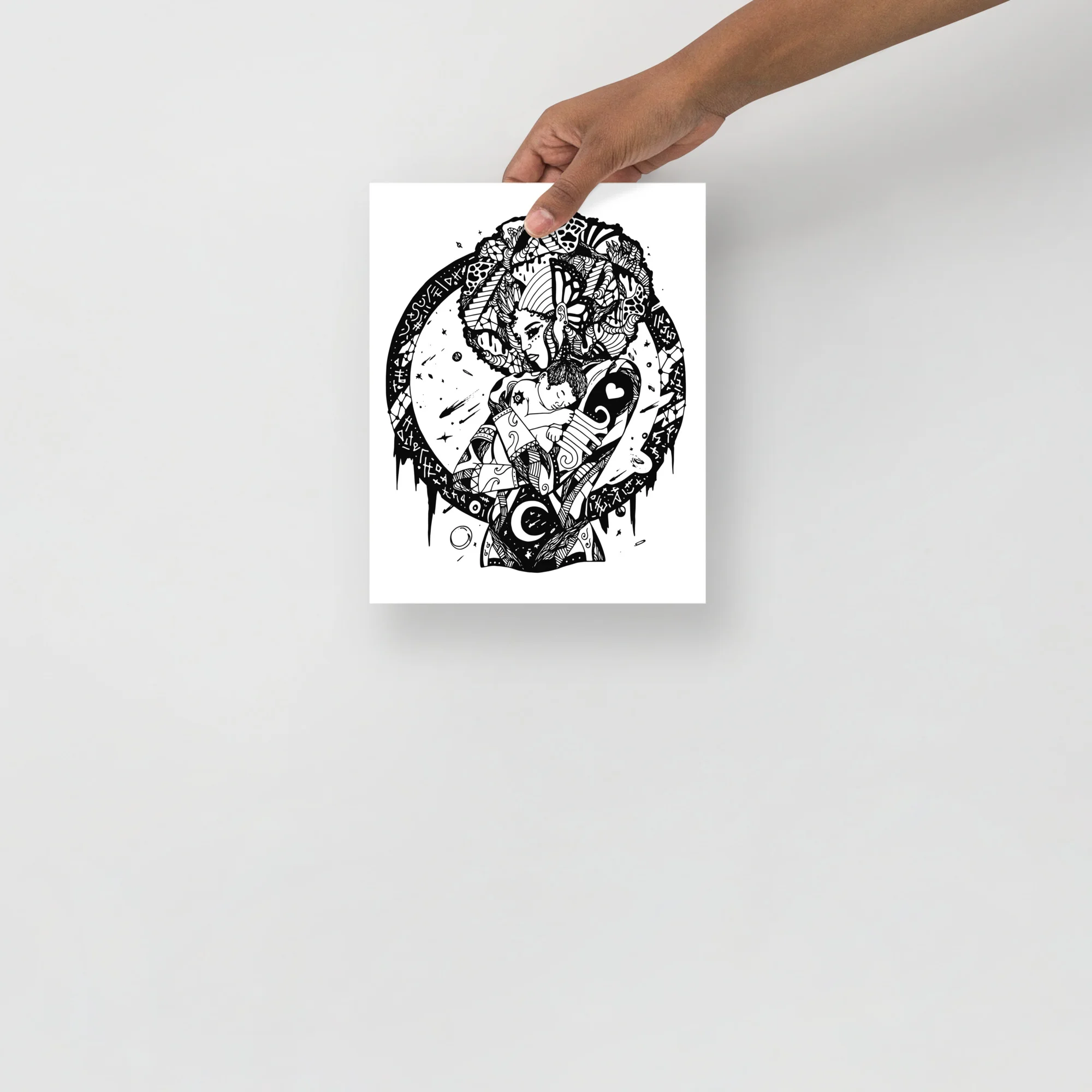 Black and white mother and child art print featuring intricate pen and ink line work with symbolic imagery on white paper.