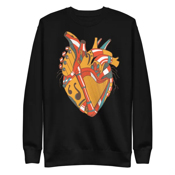 Black musical heart sweatshirt featuring colorful anatomical heart design with ornate musical instrument details
