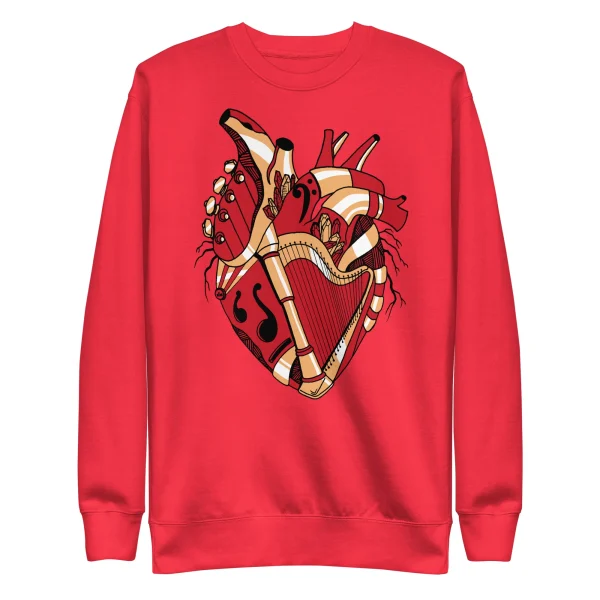Red musical heart sweatshirt with cream and tan anatomical heart design featuring decorative strings and flowing ribbons