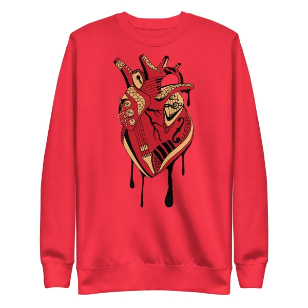Red musical heart sweatshirt features cream and gold guitar artwork with dripping design on front