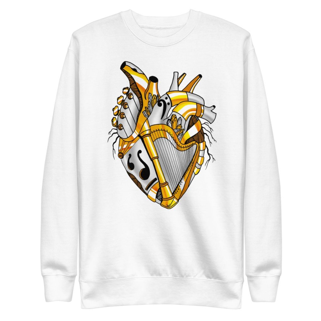 Gold heart drawing sweatshirt blending musical instrument art with warm metallic tones