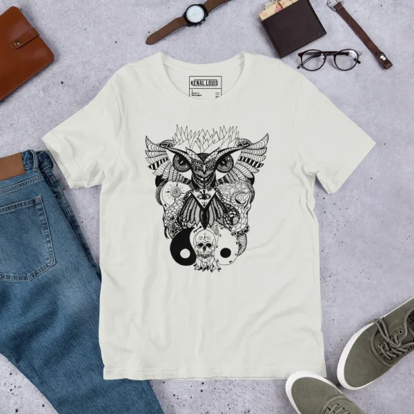 Cream colored owl and skull t-shirt with intricate black line art design featuring an owl with spread wings above a skull.