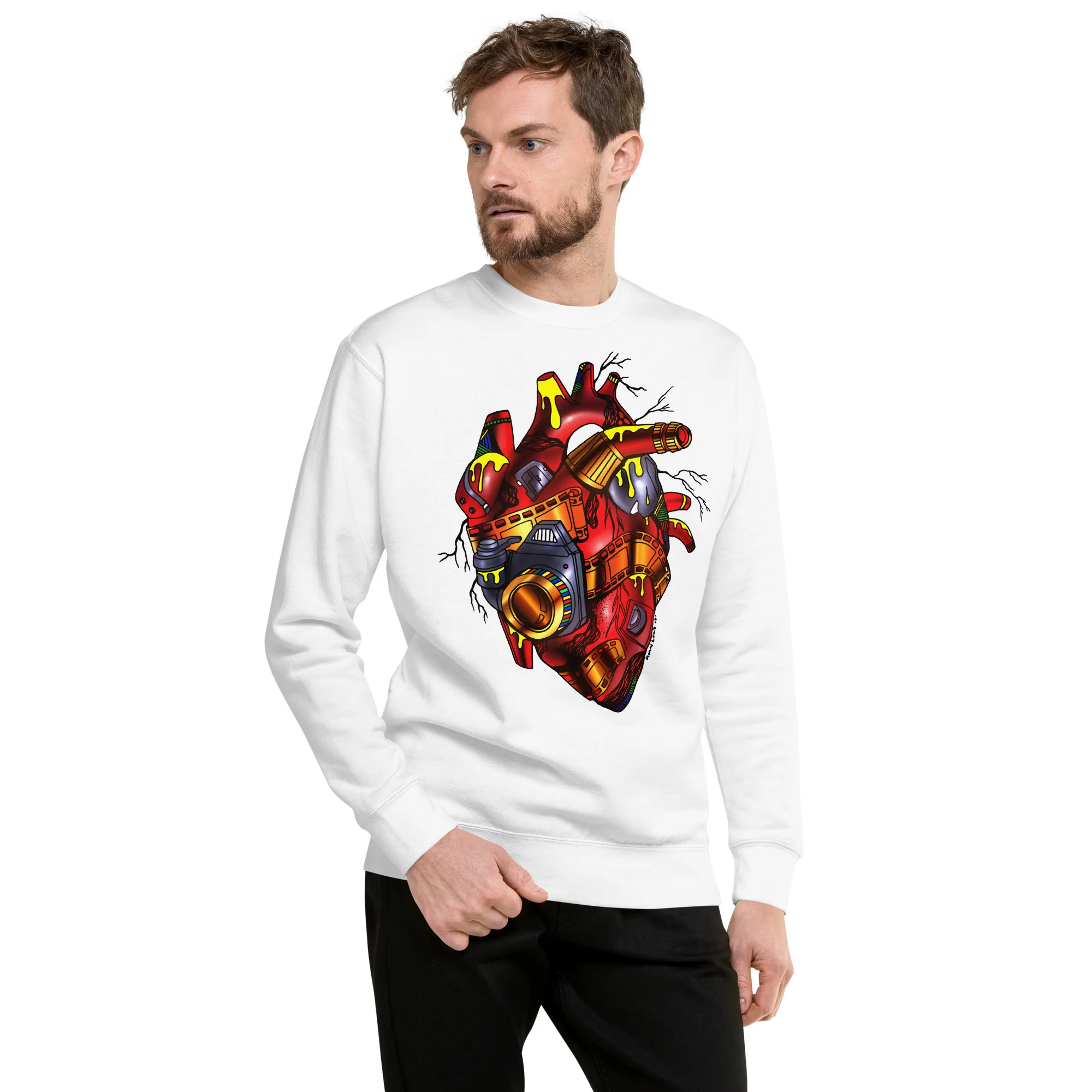 Man wearing white photographer sweatshirt with red mechanical heart design featuring camera details