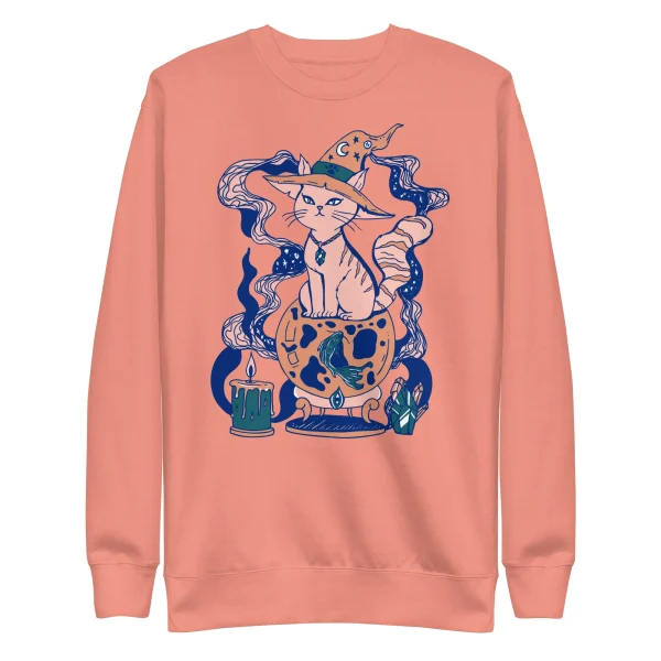 Dusty rose pink cat sweatshirt featuring a magical fortune cat illustration with wizard hat and mystical elements in navy blue