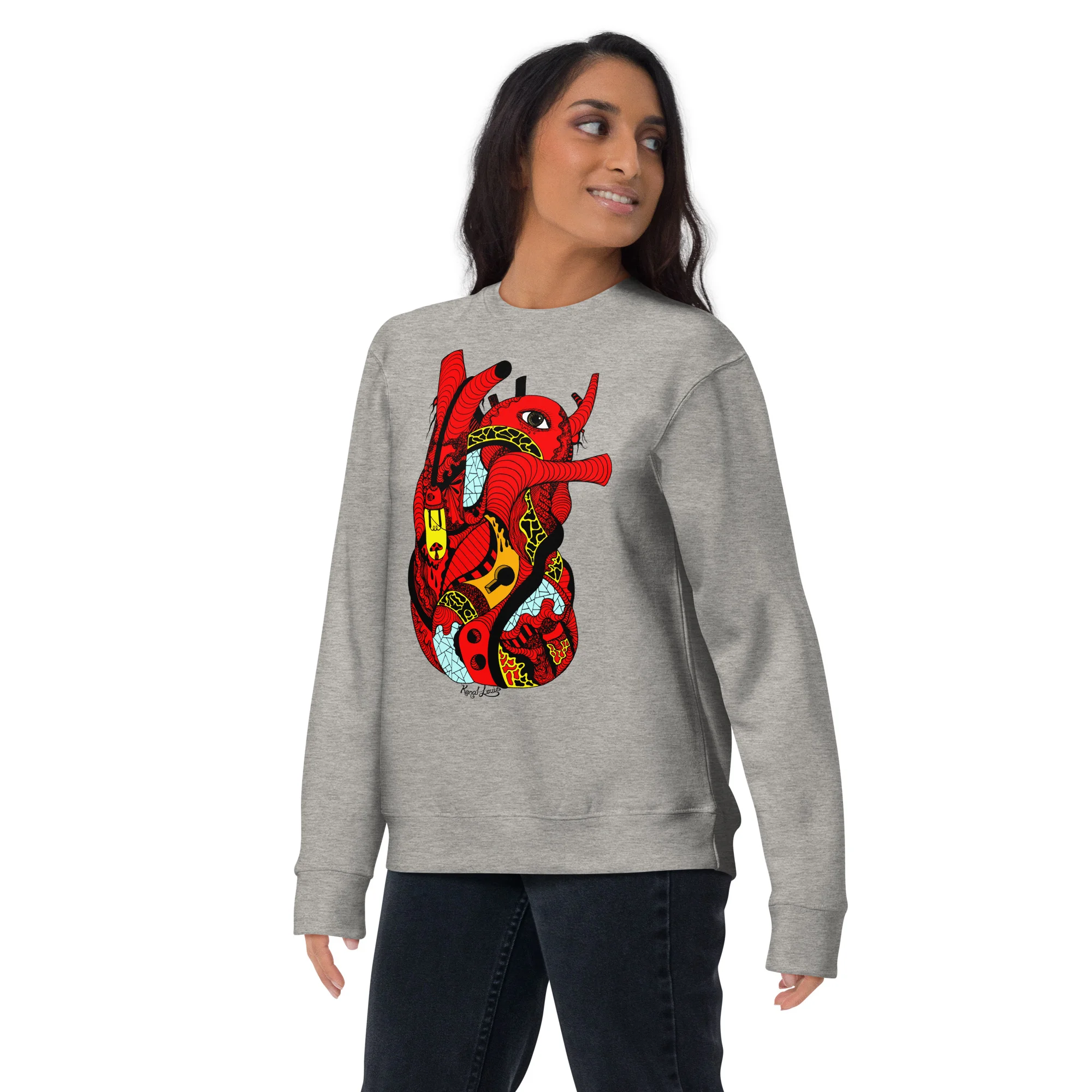 Woman wearing a grey red heart sweatshirt with colorful artistic heart graphic design