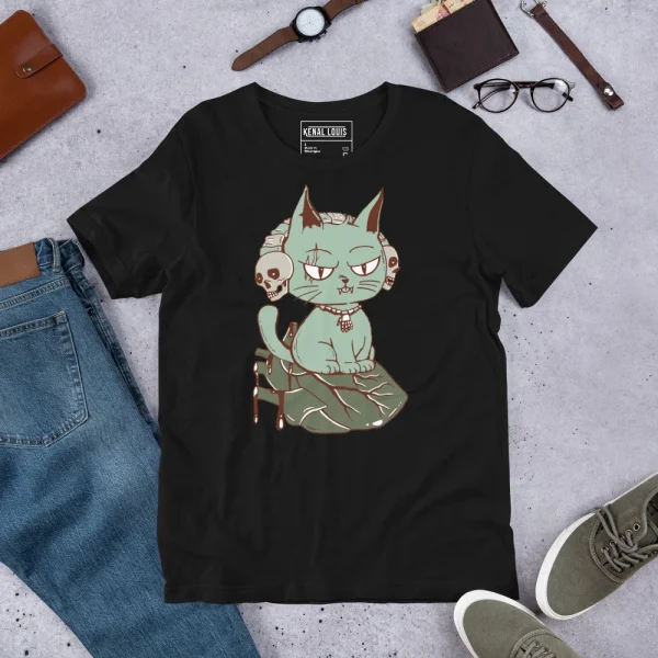 Black sage green cat t-shirt featuring a wicked feline perched on a heart with artistic design, displayed flat lay with accessories.