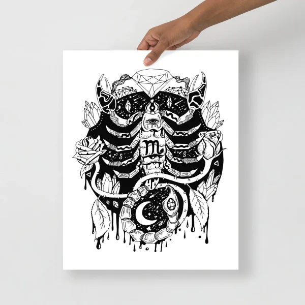 Scorpio zodiac art print featuring a detailed black and white skull design with horns, crystals, roses, and celestial symbols on white paper