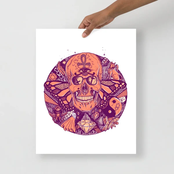 Striking skull art print in peach and purple tones with ornate details, mystical symbols, and decorative patterns arranged in a circle.