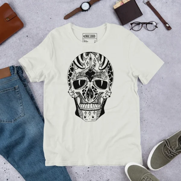 Cream colored skull t-shirt with ornate black ink graphic design featuring decorative patterns and sunglasses