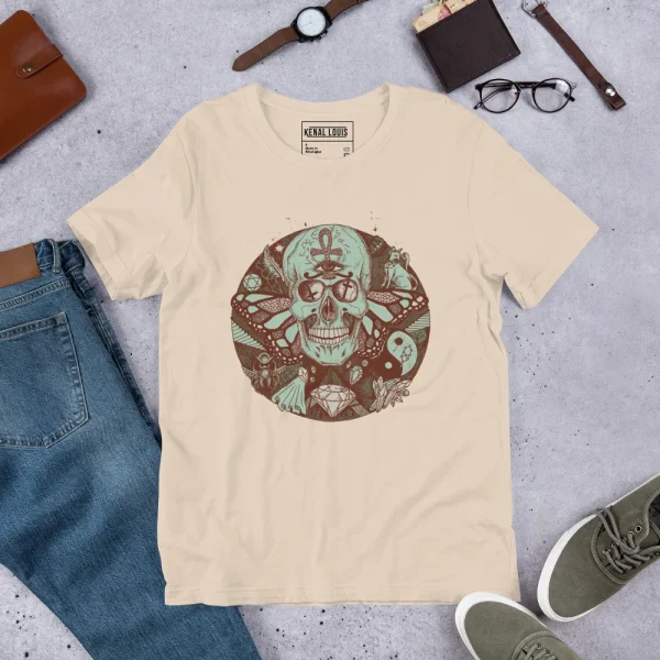 Cream skull t-shirt featuring a circular sage green and brown skull art design with decorative elements
