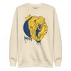 Elephant sweatshirt with a crowned royal elephant line art illustration by Kenal Louis, shown in bone, dusty rose, red, and white colorways