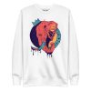 Elephant sweatshirt with a crowned elephant crown illustration by Kenal Louis, shown in bone and dusty rose crew neck styles