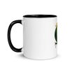 Colorful ceramic elephant mug featuring a royal crown illustration drawing by Kenal Louis, with tinted rim, handle, and interior