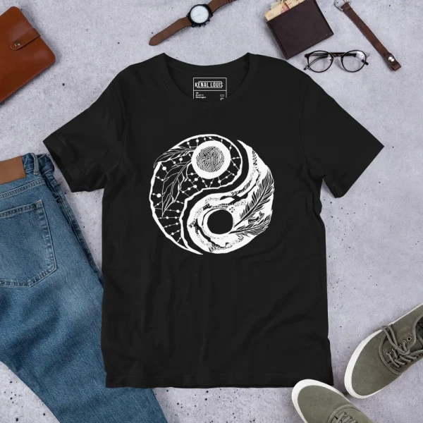 Black yin yang t-shirt with white feather line art graphic design displayed flat with accessories