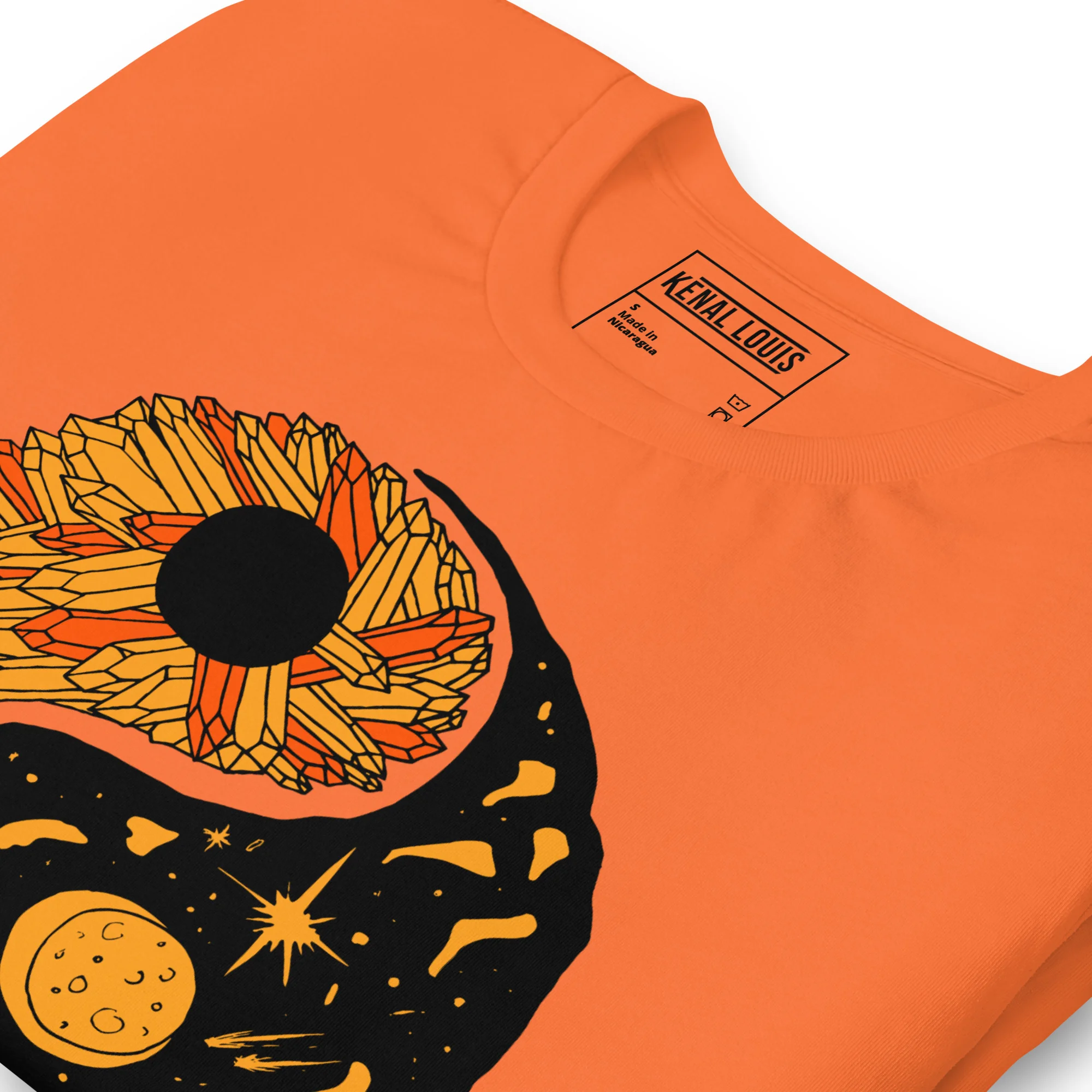 Orange yin yang t-shirt featuring a sunflower design with black cosmic elements and moon motif on the front